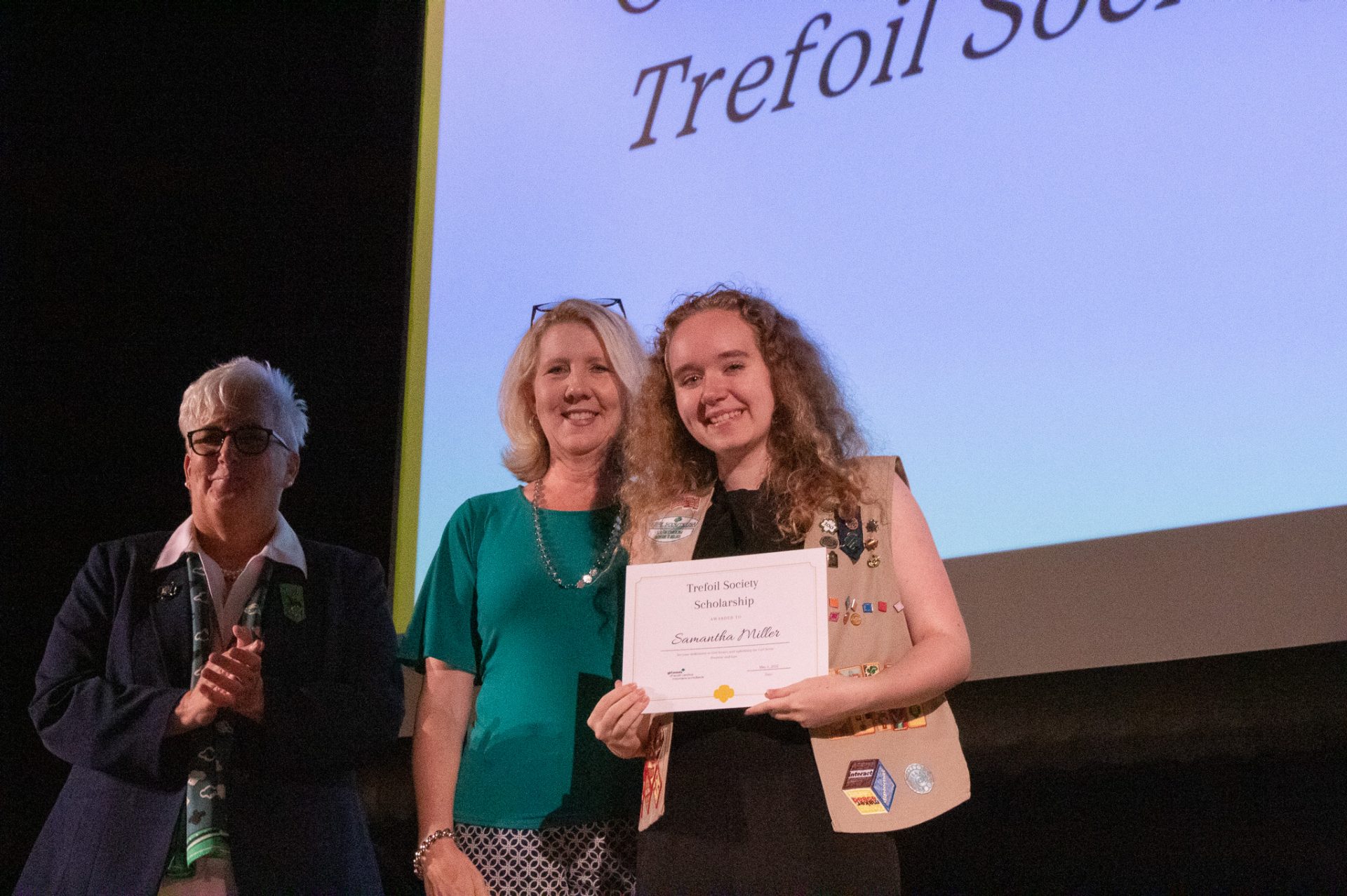 Frances Griggs, board chair, poses with the Trefoil Society Scholarship recipient