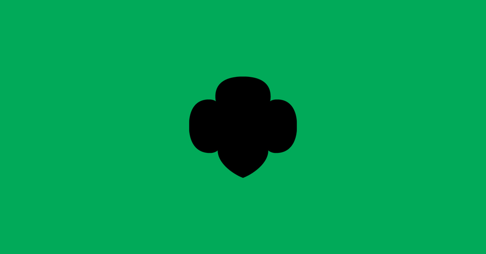  The Girl Scout Trefoil in black on a green background 