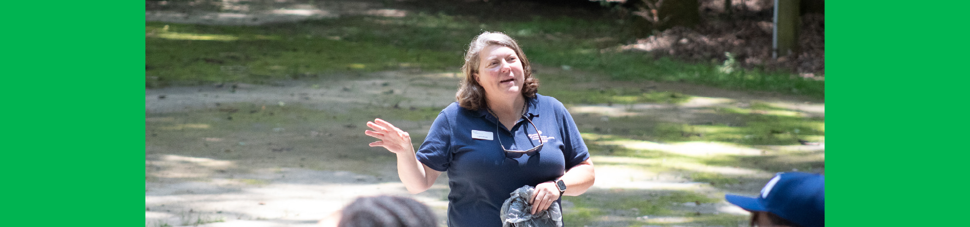  CEO Lora stands in frame during a video recording session 