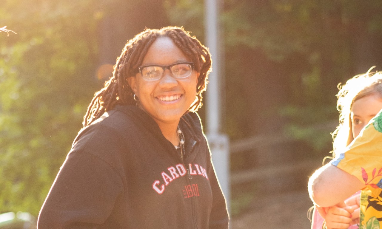 a camper smiles during a friendship circle