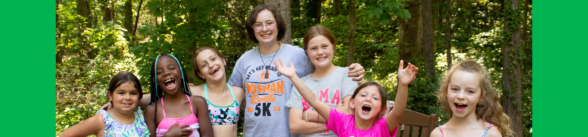  A camper smiles through a yoga pose at Camp Mary Elizabeth 